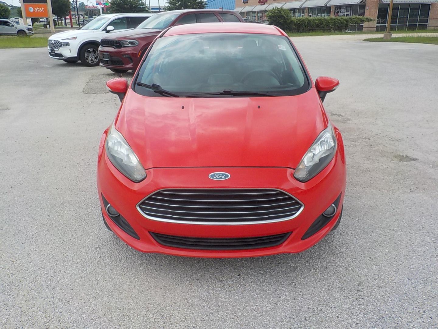 2014 Red /Charcoal Ford Fiesta (3FADP4BJ0EM) , Automatic transmission, located at 1617 W Church Street, Livingston, TX, 77351, (936) 327-3600, 30.710995, -94.951157 - WOW!! Need to check this one out for the price range it's in! You won't be disappointed! - Photo#2